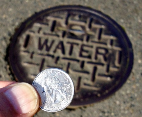 The Coin and the Manhole Cover